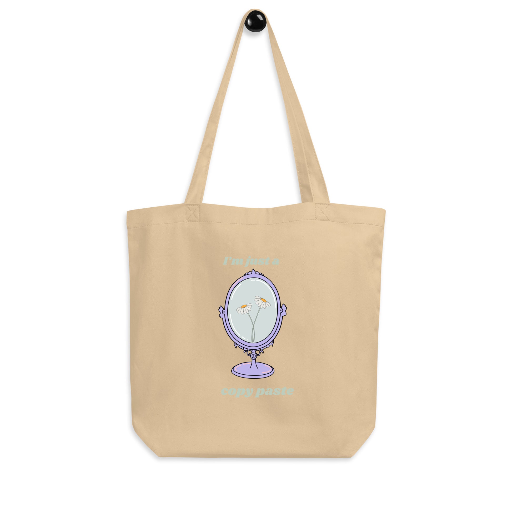 Copy Paste Tote Bag She Is Jules Official Music Merch hung up